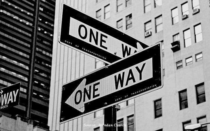 one way street signs with credit