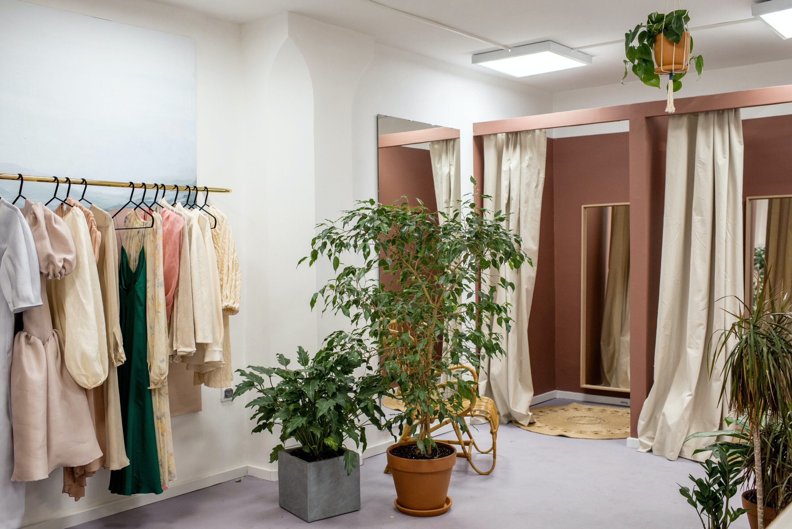 a modern retail store with clothing on display